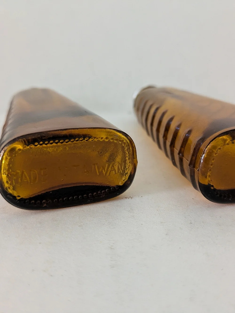 Amber Glass Salt and Pepper Shakers with Silver Tops. Made In Taiwan